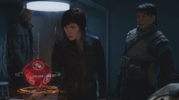 DVD-ghost-in-the-shell-group-looking-at-computer