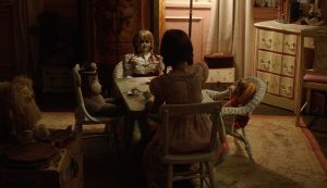 Annabelle-Creation-playing-at-table