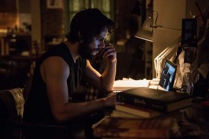 American-Assassin-at-desk